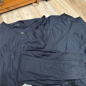Cherokee Form scrubs, two tops both medium. Bottoms medium. Original price 150$